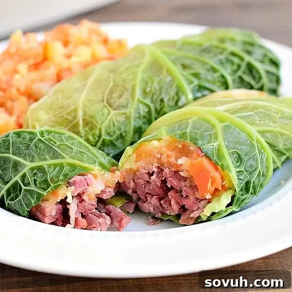 Two neatly plated corned beef cabbage rolls, ready to be enjoyed as a delicious Irish dinner.