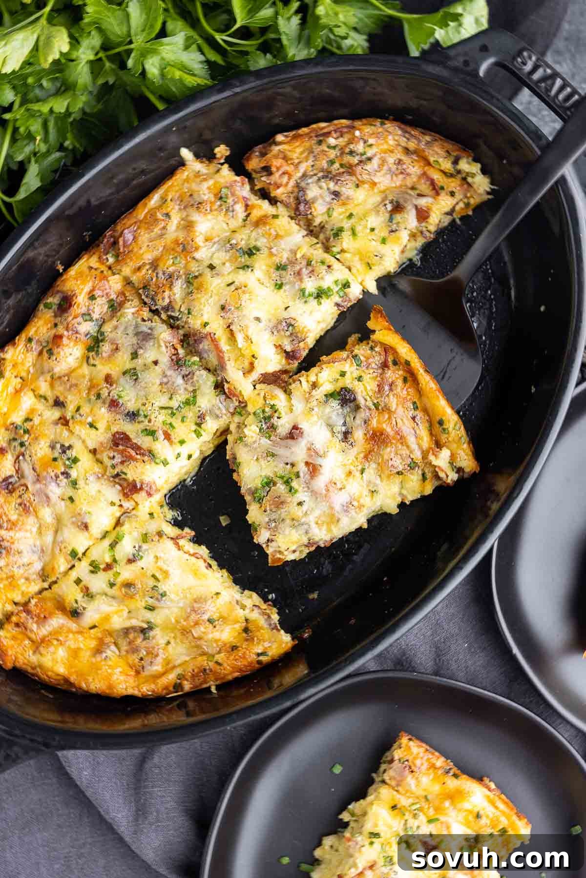 Keto crustless quiche in a black dish