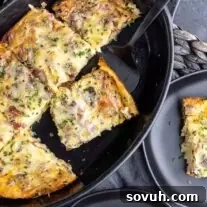 Keto crustless quiche in a black dish