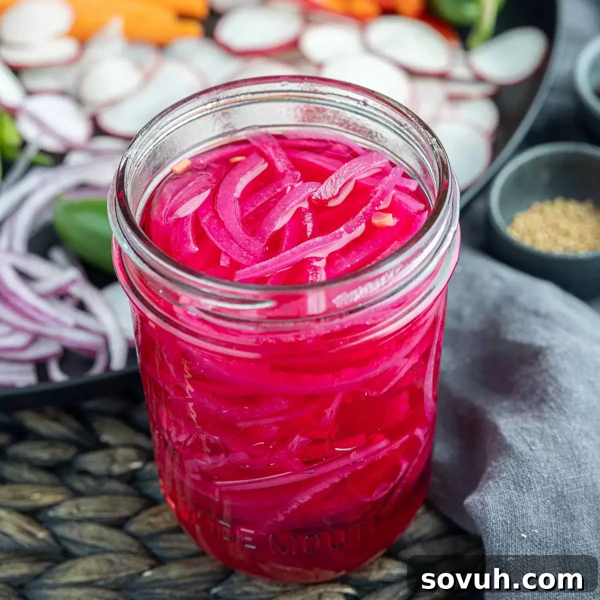 Pickled Red Onions in a clear glass jar