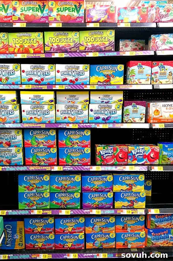 In-store display of Capri Sun Roarin' Waters at Walmart, ideal for stocking up on drinks for a Kids' Choice Awards party.
