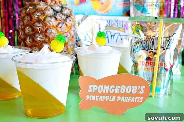 Final presentation of SpongeBob's Pineapple Parfaits, showing the successful slanted Jell-O layer and Cool Whip topping, perfect for a Kids' Choice Awards Party.
