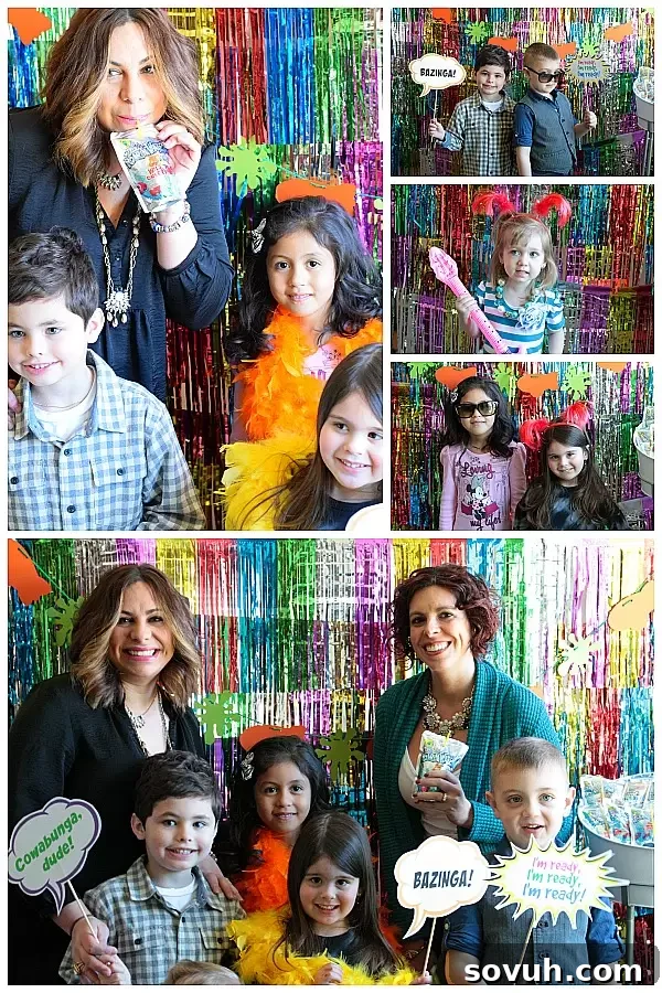 Happy kids posing in front of the sparkly backdrop at a Kids' Choice Awards viewing party, enjoying the fun atmosphere.
