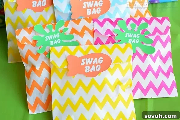 Custom Kids' Choice Awards party swag bags filled with cookies, a thoughtful take-home gift for young guests.