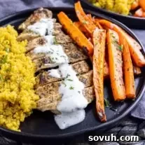 Za’atar Chicken with yogurt sauce on top