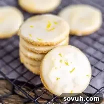 Lemon Shortbread Cookies stacked on cooling rack