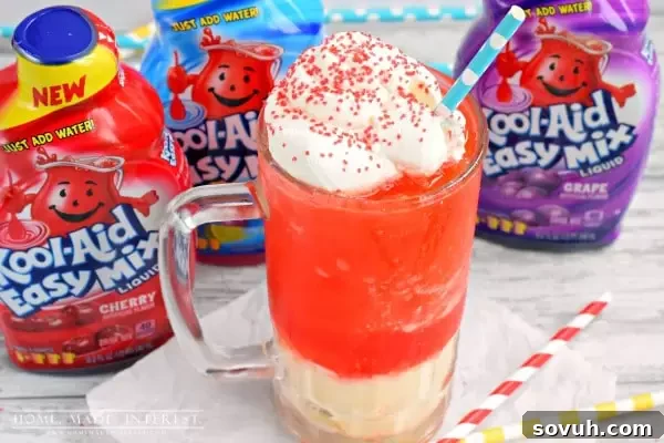 Kool-Aid Easy Mix bottle in Tropical Punch flavor, prominently displayed, highlighting its convenience for making summer beverages.