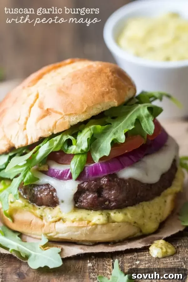 Gourmet Tuscan Garlic Burger oozing with pesto mayo sauce, a flavor-packed burger.