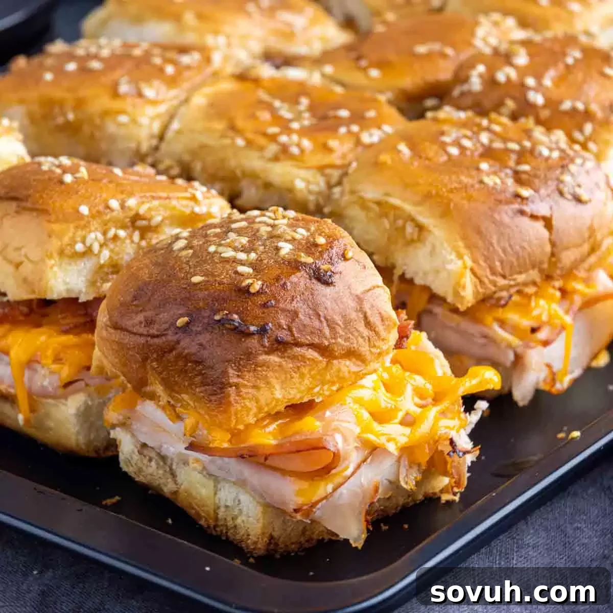 Sheet pan with delicious Baked Turkey Sliders, ready to serve.