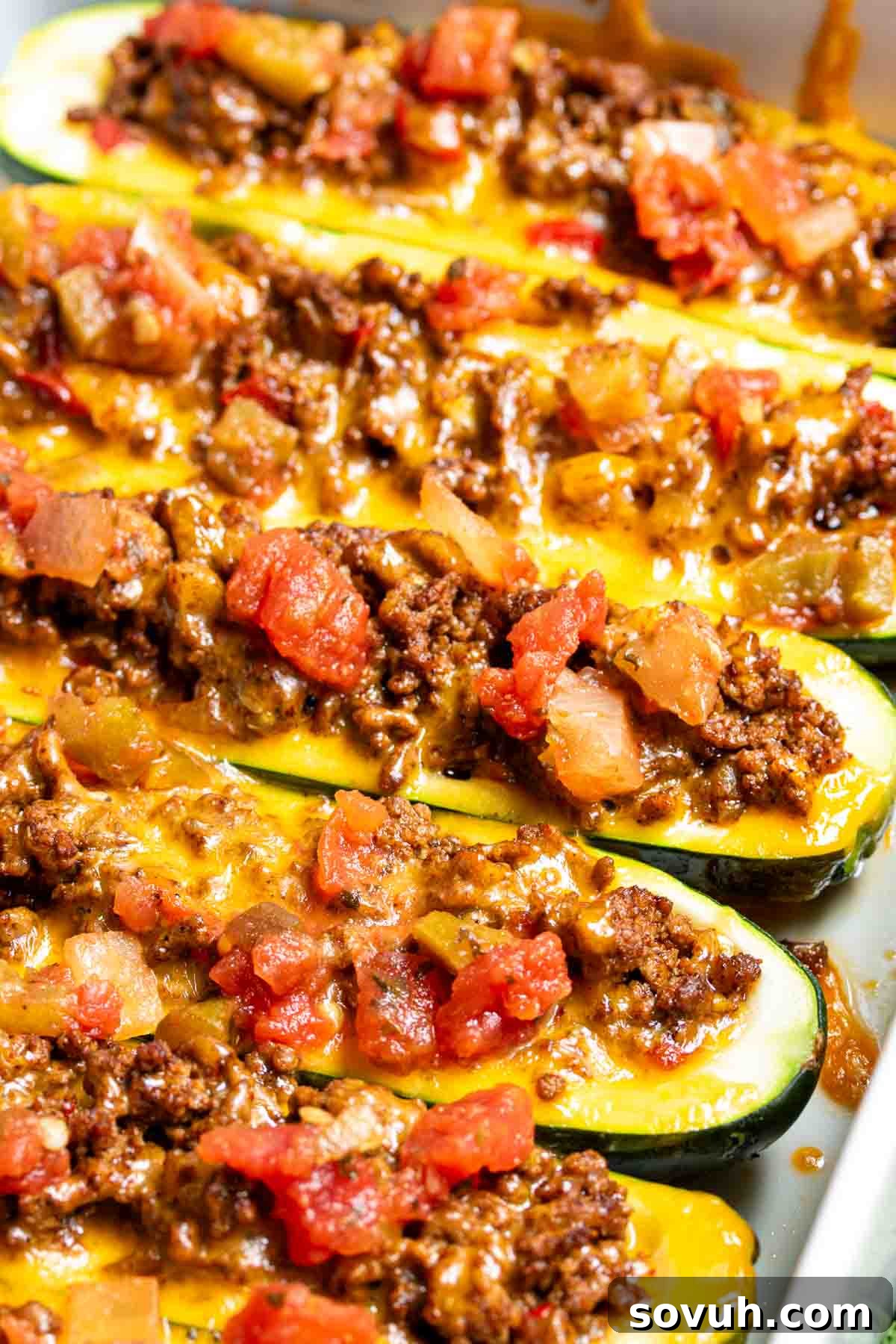 keto Taco Zucchini Boats stuffed with ground beef, cheese and Rotel, ready to serve