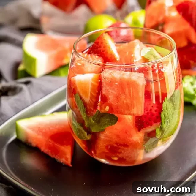 A refreshing glass of strawberry watermelon infused water, highlighting its natural goodness
