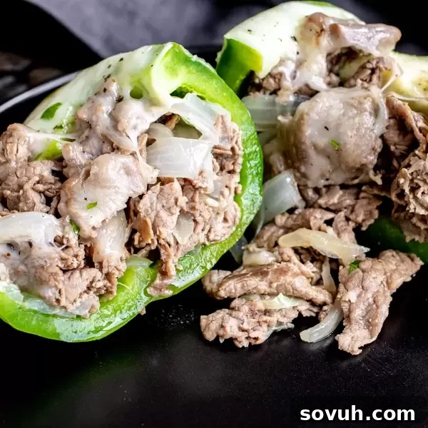 Low Carb Philly Cheesesteak Stuffed Peppers in a baking dish