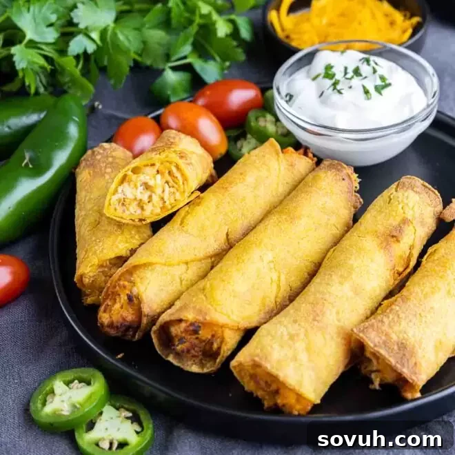 Air Fryer Taquitos made with shredded chicken, perfectly golden and ready to serve.