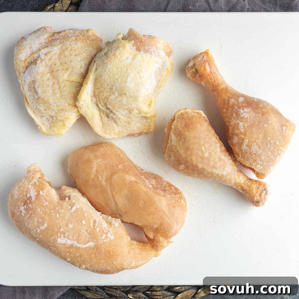 frozen chicken on a cutting board