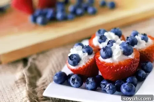 Homemade red, white, and blue popsicles. Refreshing treat for kids and adults on the Fourth of July.