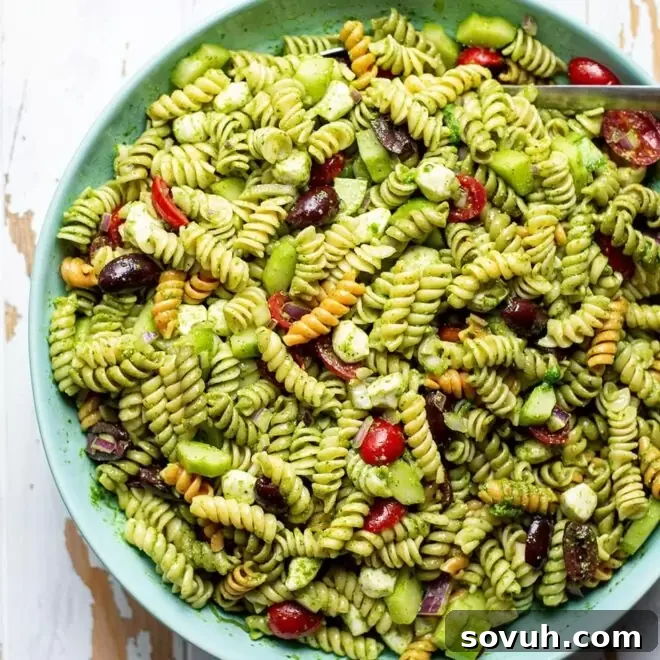 Blue bowl with pesto pasta salad