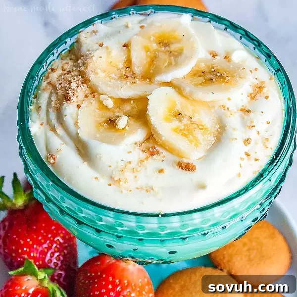 Banana Cream Cheesecake Dip | If you like banana pudding you’re going to love this no bake banana cream cheesecake dip! It is an easy no bake dip recipe that combines, pudding, bananas, cream cheese, and whipped cream to make a rich and delicious dessert dip recipe that taste just like banana pudding when you eat it on a vanilla wafer! This banana cream cheesecake dip will make a perfect Easter dessert or summer dessert recipe for cookouts!