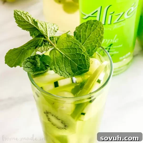 A vibrant Green Goddess Hard Lemonade, an adult lemonade recipe perfect for summer cocktails.