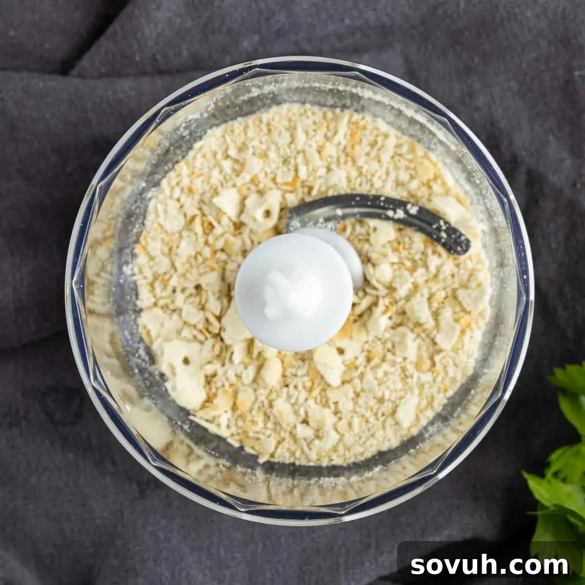 A food processor filled with saltines to make Maryland Crab Cakes