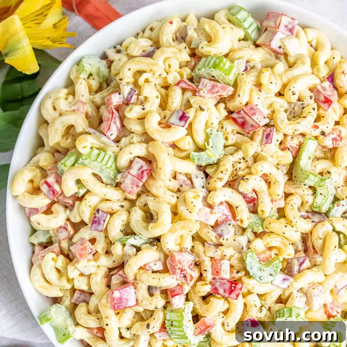 Mastering the Potluck: Unforgettable Dishes for Any Gathering 9 Classic Macaroni Salad in a bowl