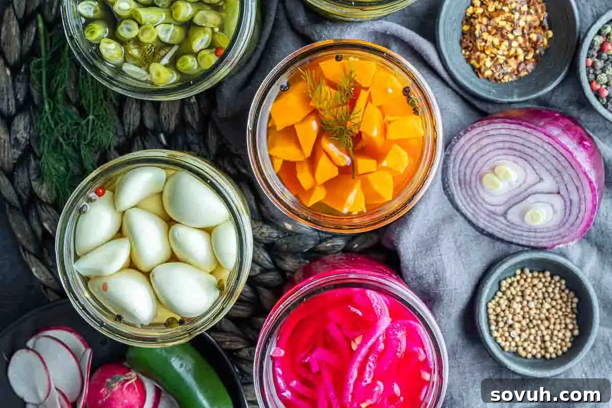 An assortment of pickled vegetables in jars, including onions, radishes, and peppers, surrounded by spices and fresh ingredients.