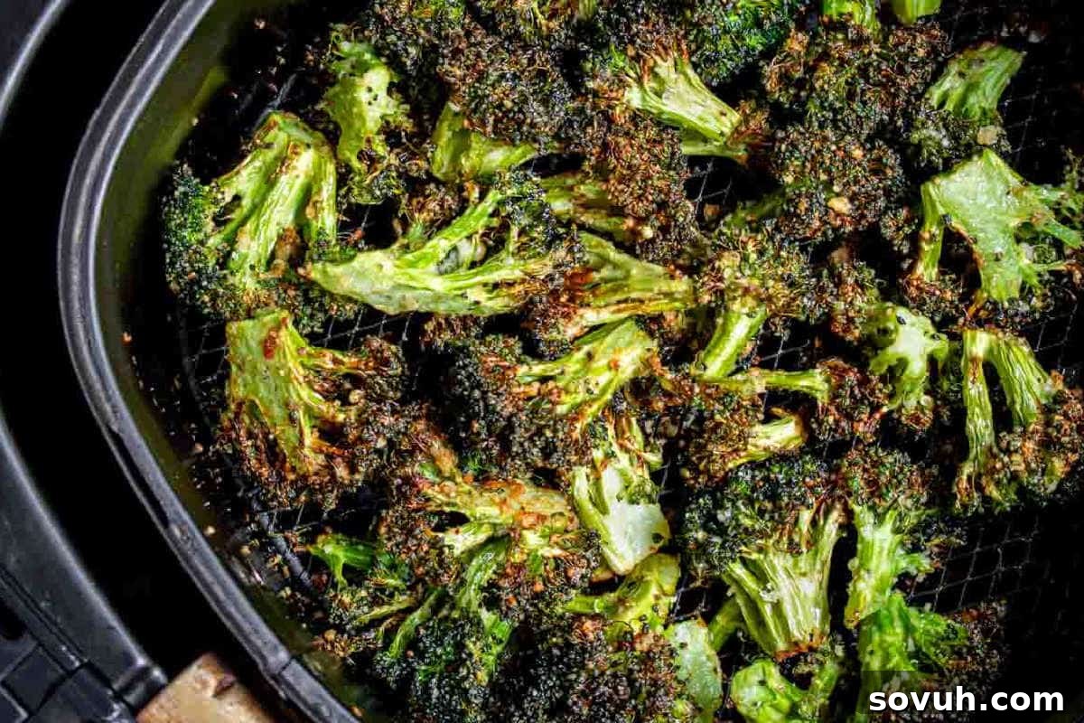 crispy air fryer broccoli in air fryer basket