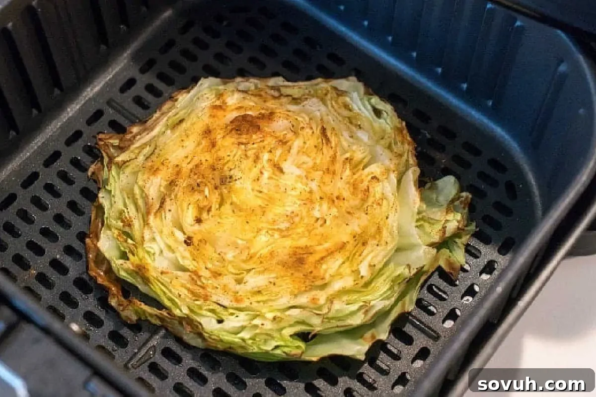 a slice of cabbage roasting in an air fryer