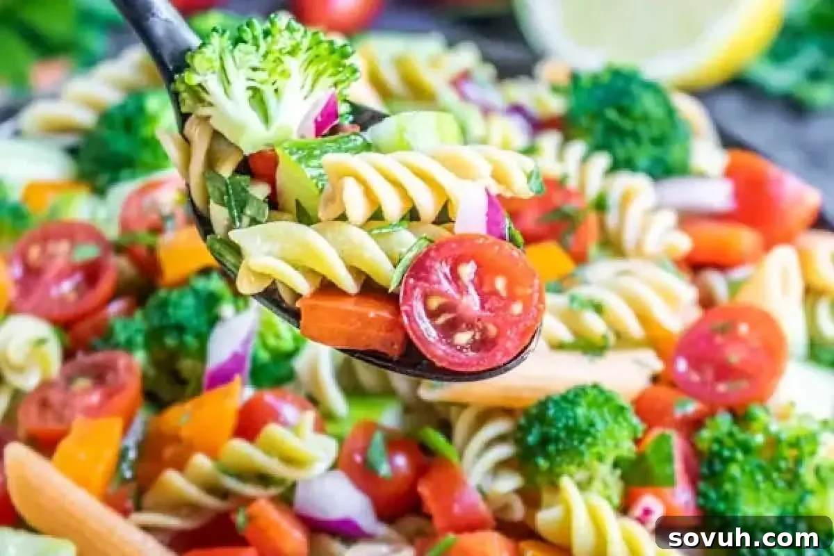 Fresh Vegan Pasta Salad with gluten-free pasta and a variety of colorful vegetables