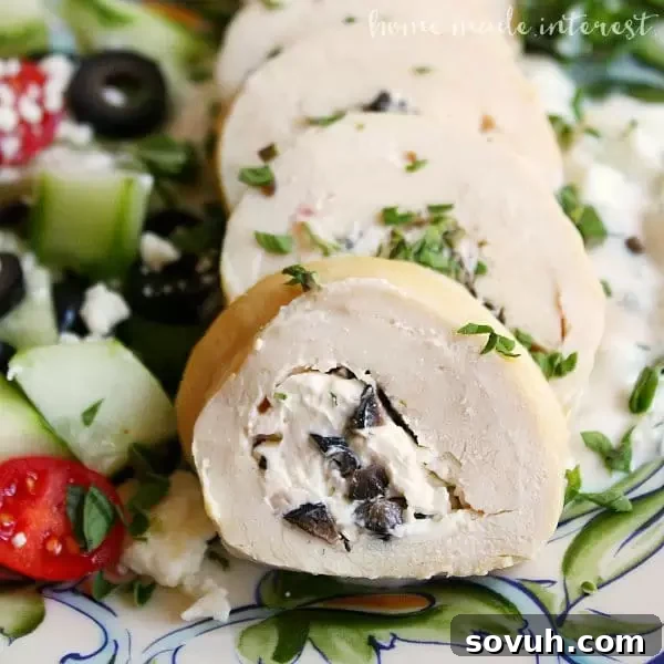 Close-up of Greek Chicken Roll-Ups highlighting the olive and feta filling, perfect for a flavorful Mediterranean dinner.