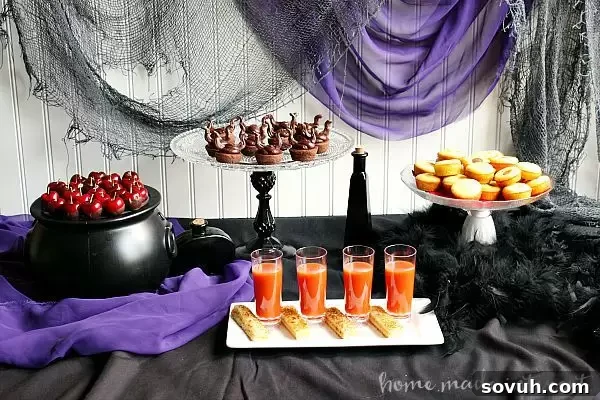Disney Descendants party tablescape with villain-themed decorations and black, purple, and creepy elements