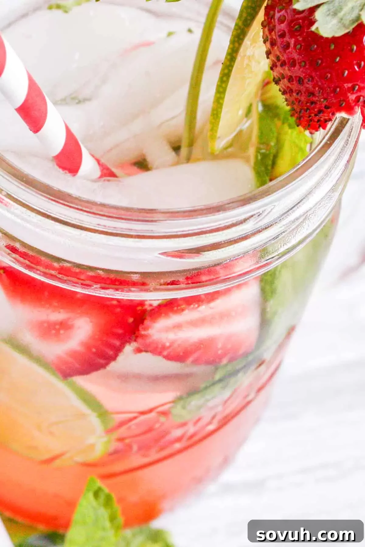 Strawberry mojito in a mason jar.
