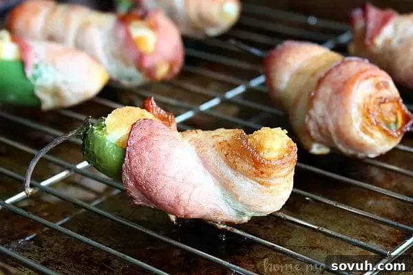 This snack hack makes bacon wrapped jalapeño poppers even easier! This is a great recipe for game day or just a fun party appetizer.