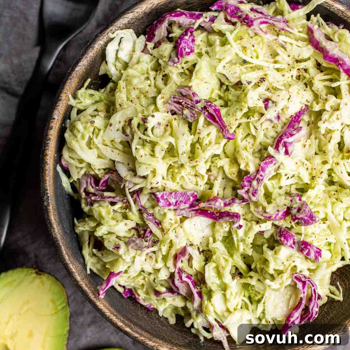 Avocado Keto Coleslaw in wooden bowl