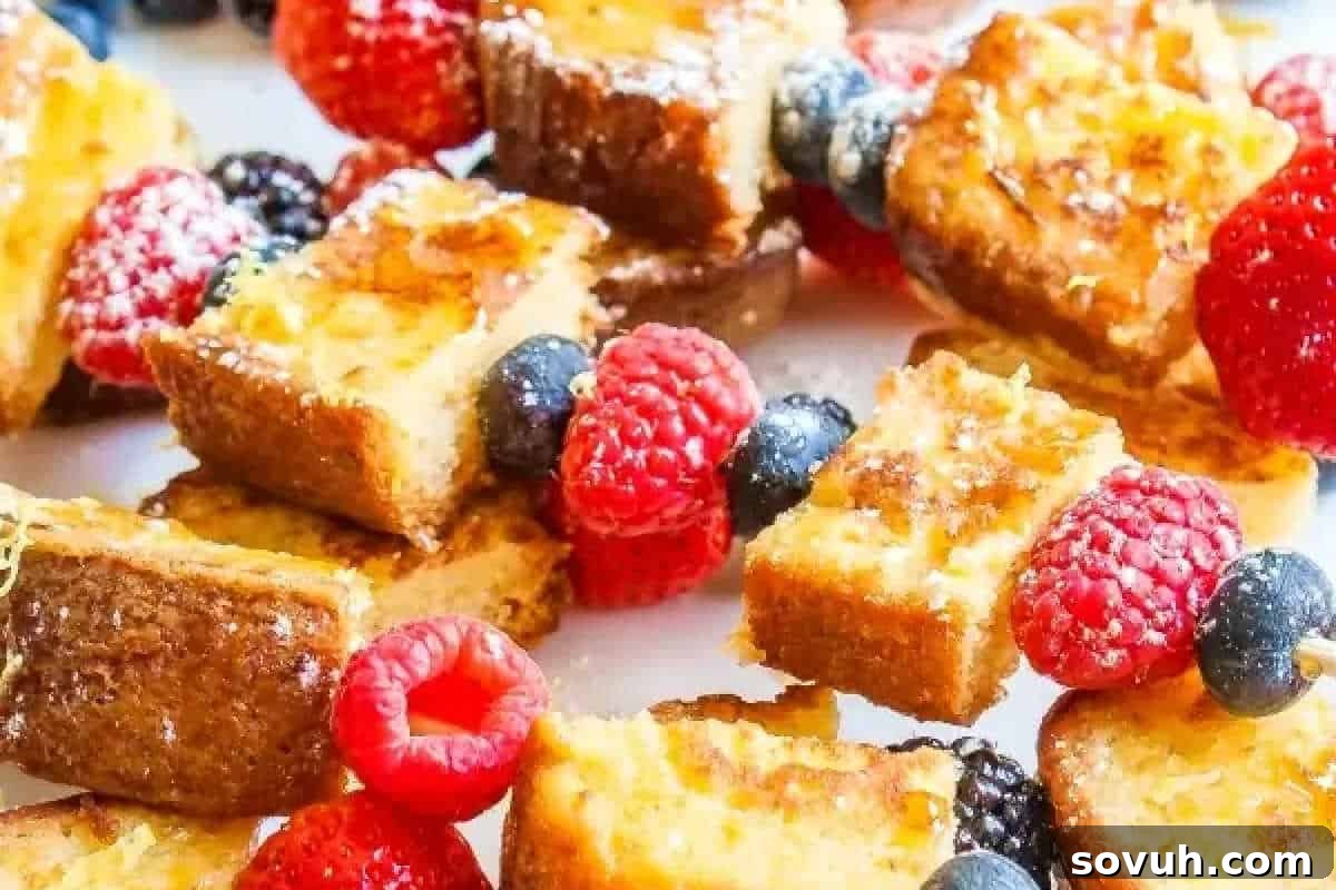 Savor the delightful flavors of French toast skewered with fresh raspberries, blueberries, and blackberries—a perfect centerpiece for your Easter brunch spread.