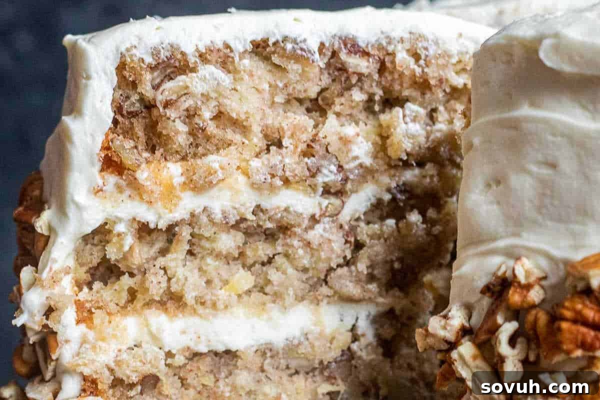 Whimsical Easter Treats Made Simple 13 Close-up of a slice of layered cake with creamy frosting and chopped nuts.