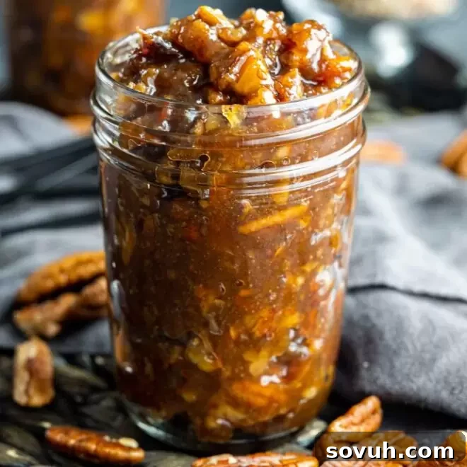 Pecan Pie Filling in a mason jar, ready to be used in various desserts.