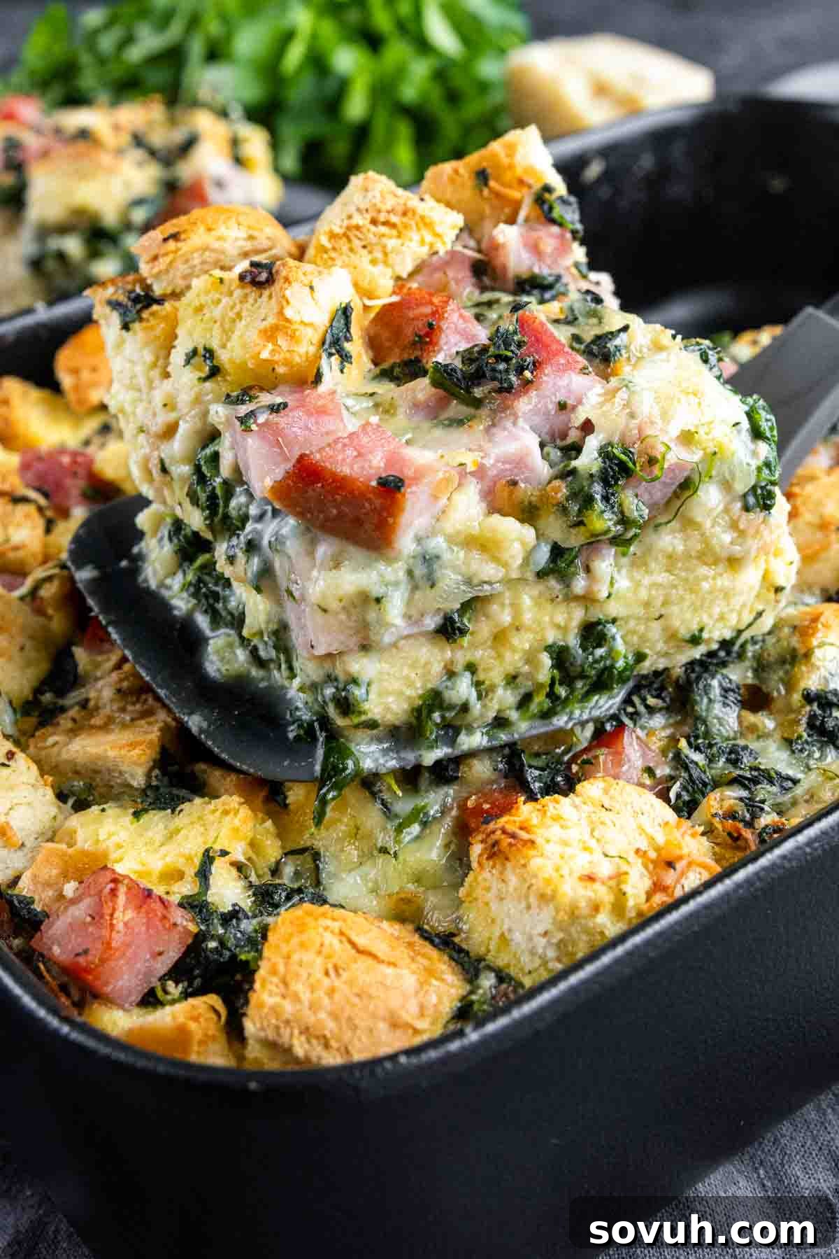 Ham and Cheese Strata in a black pan.