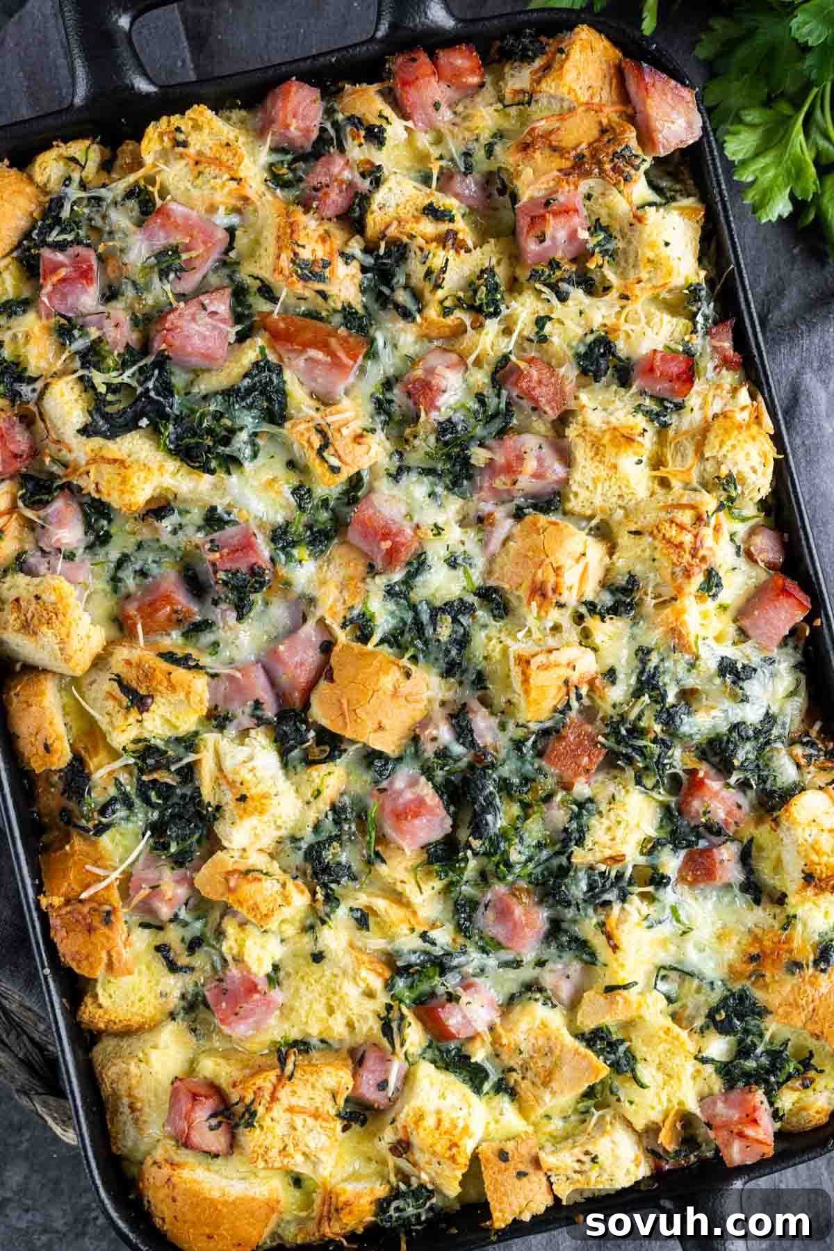 Ham and Cheese Strata in a cast iron pan.
