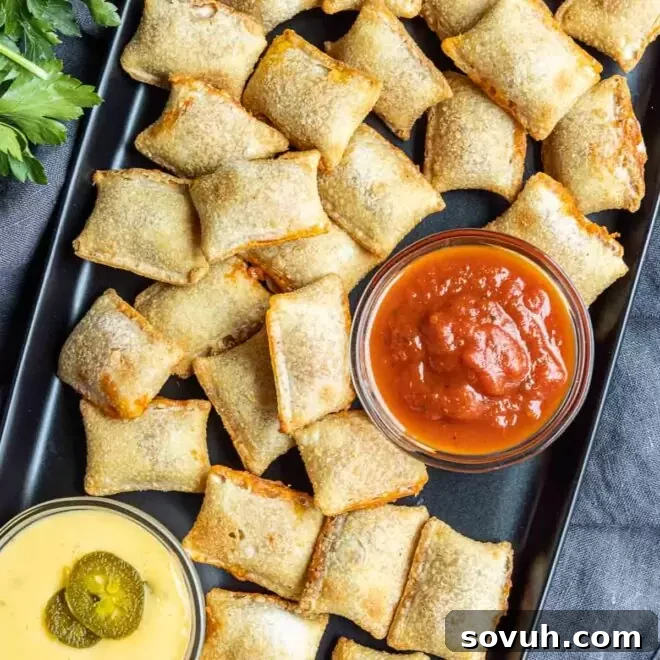 dipping Air Fryer Pizza Rolls in pizza sauce