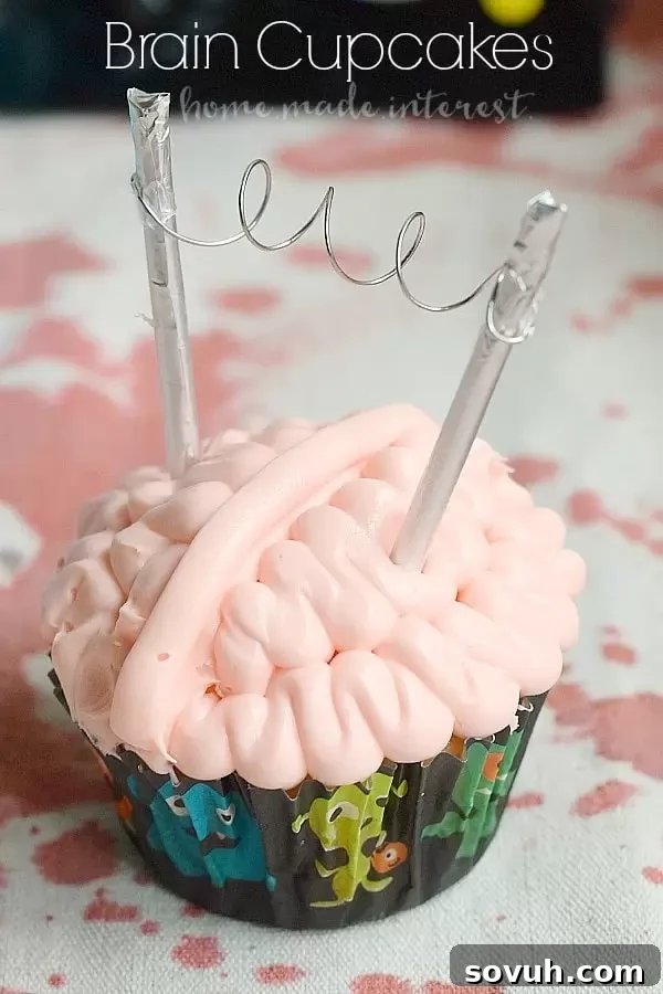 Mental Morsels 2 These creepy brain cupcakes are what every mad scientist wants at his Halloween Party. Tutorial for how to frost the cupcakes and a simple DIY Halloween cupcake topper.