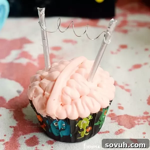 Mental Morsels 6 These creepy brain cupcakes are what every mad scientist wants at his Halloween Party. Tutorial for how to frost the cupcakes and a simple DIY Halloween cupcake topper.