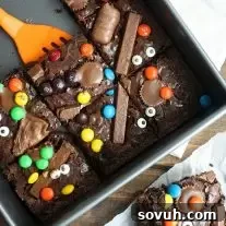 Spatula lifting brownie out of pan