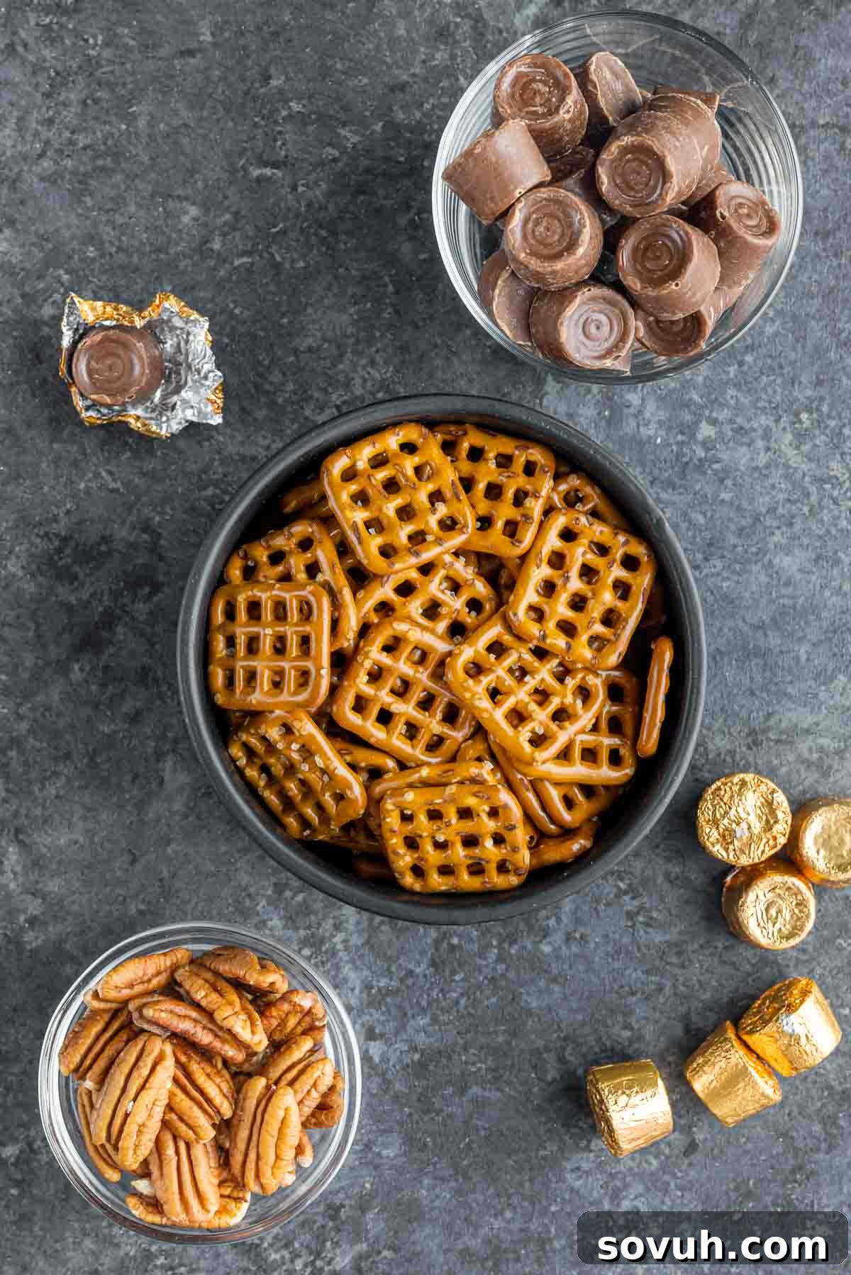 The three essential ingredients for Rolo Pretzel Turtle Candy: Rolos, Pecan Halves, and Mini Pretzels