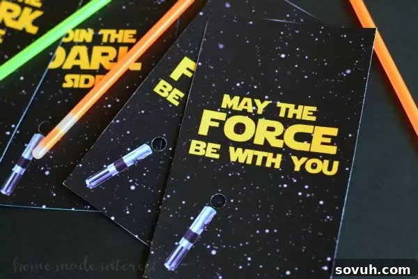 Detailed view of a DIY Lightsaber party favor, highlighting the hilt design