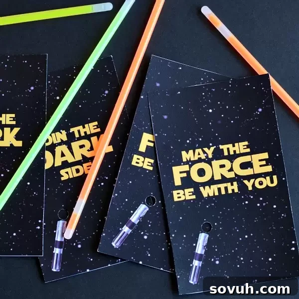 A collection of homemade lightsaber party favors ready for a Star Wars celebration