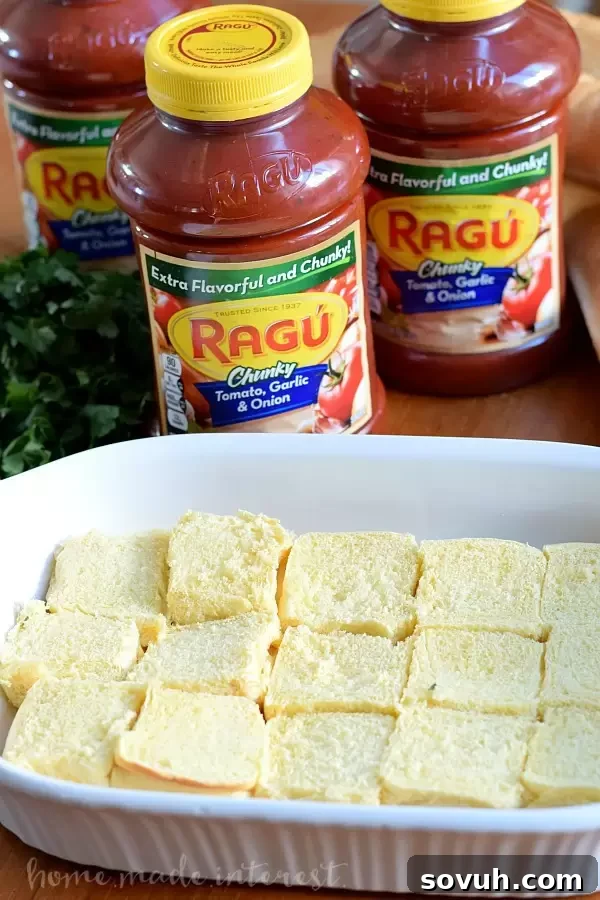 Cheesy Meatball Sliders prepared in a baking dish, ready for an easy appetizer or dinner.