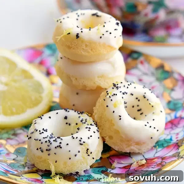 A beautiful spread of mini lemon poppy seed donuts and a cup of Lipton tea, inviting a moment of calm.