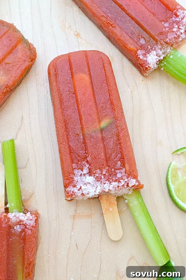 Chilled Bloody Mary Popsicles, a unique and refreshing adult treat for a hot summer day.