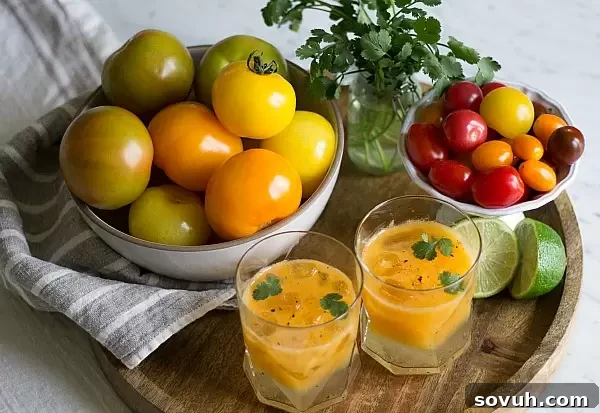 A garden-fresh Heirloom Tomato Bloody Mary, showcasing a variety of colorful heirloom tomatoes and fresh herbs.