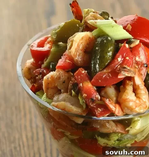 A unique Bloody Mary Tomato Salad, featuring cherry tomatoes and a vibrant dressing, a great side dish.